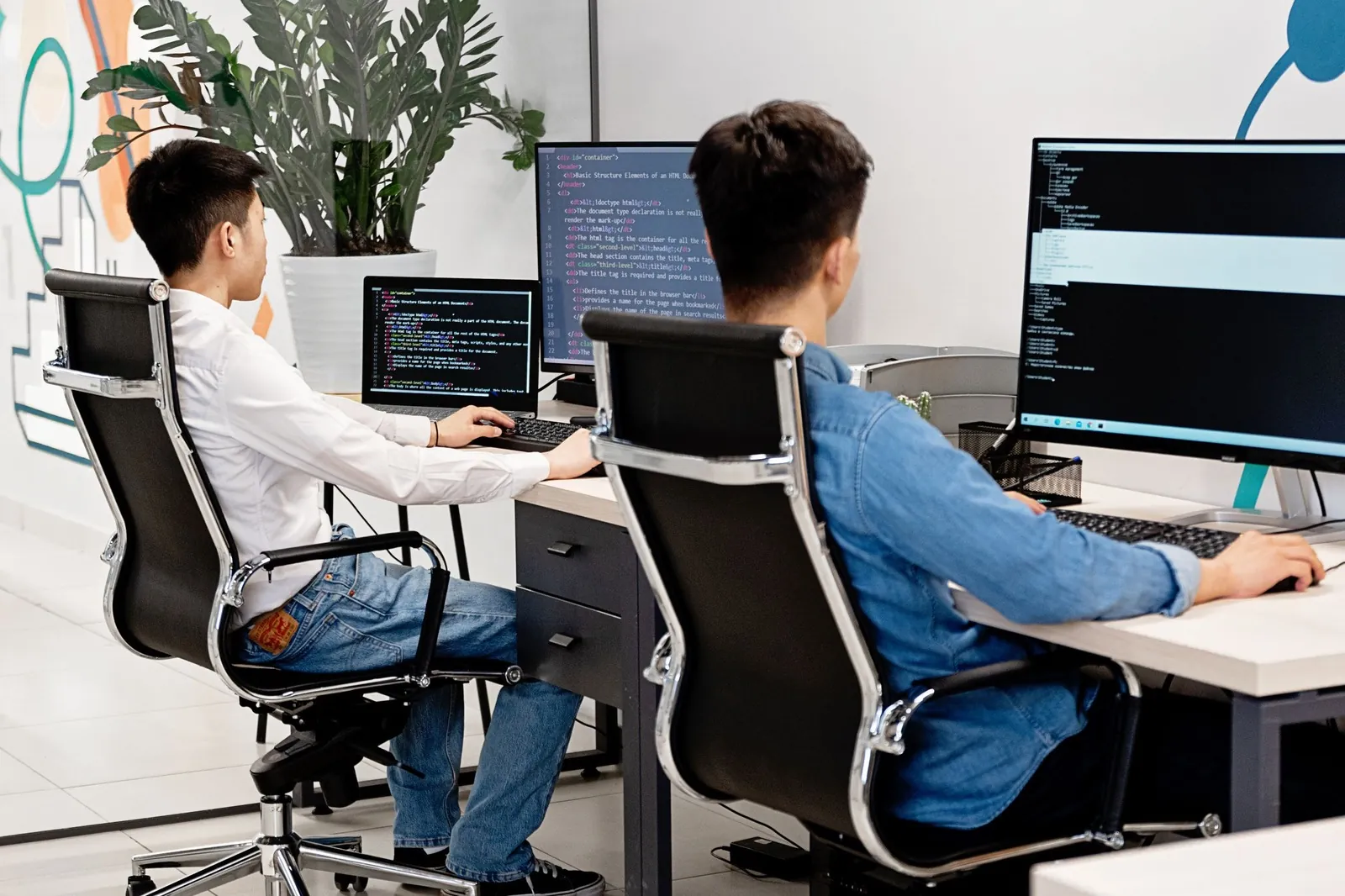 An in-house engineering team at work in an open office