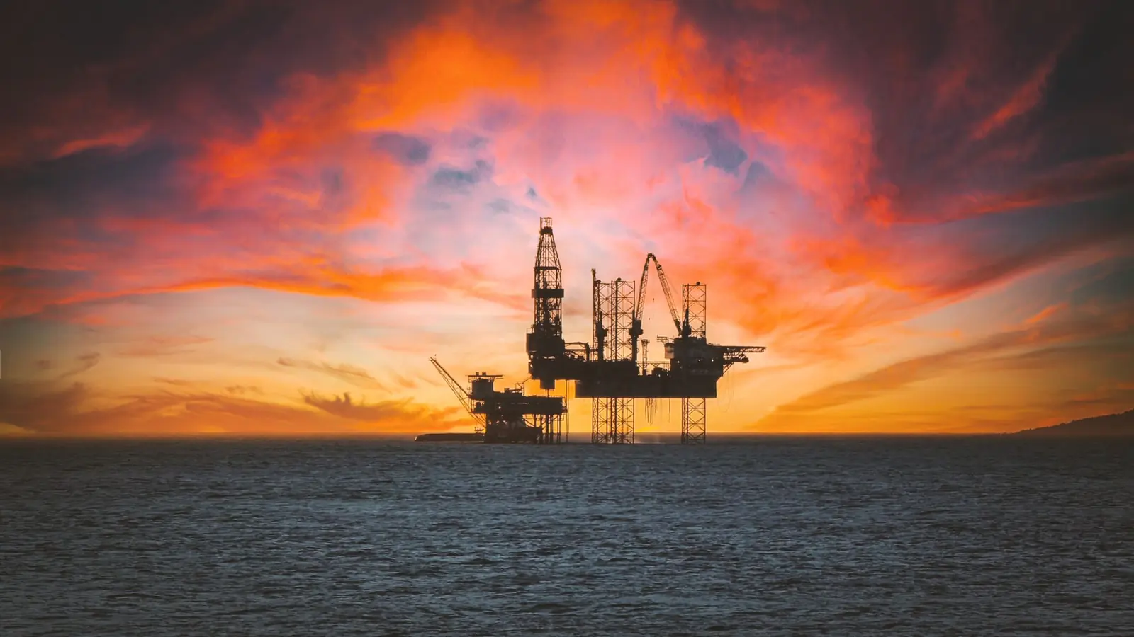 An offshore platform at sunset
